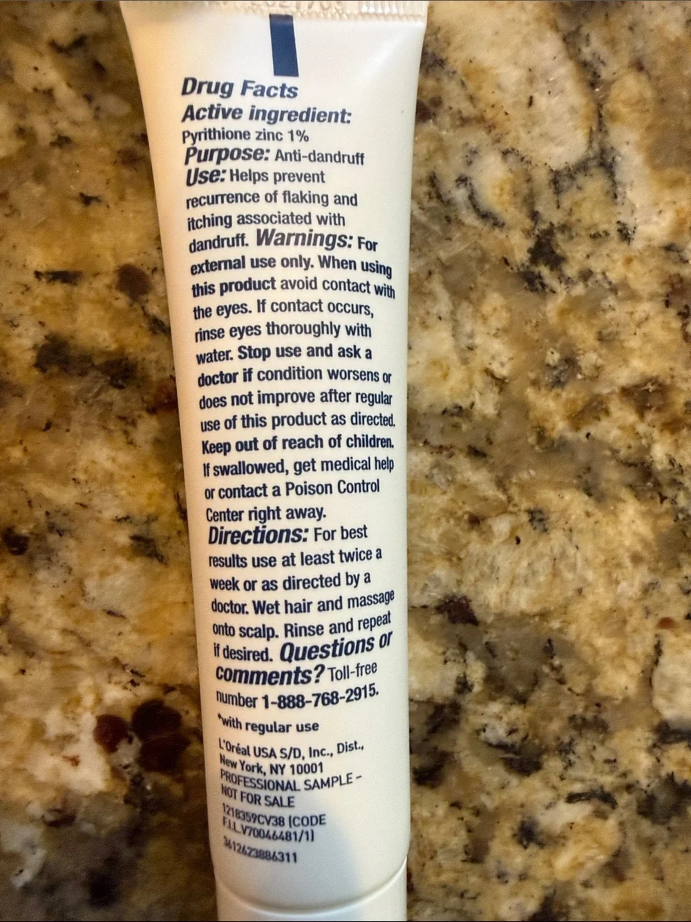 rave White Tube with Blue Accents Shampoo